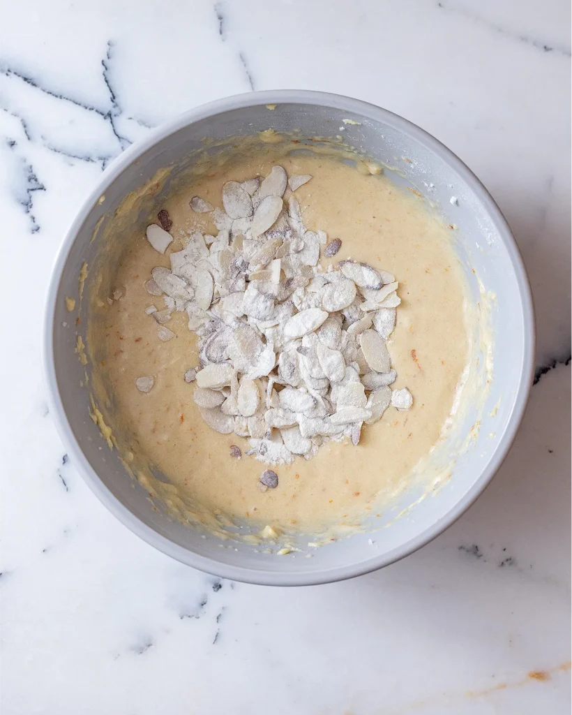 Add almonds to cake batter