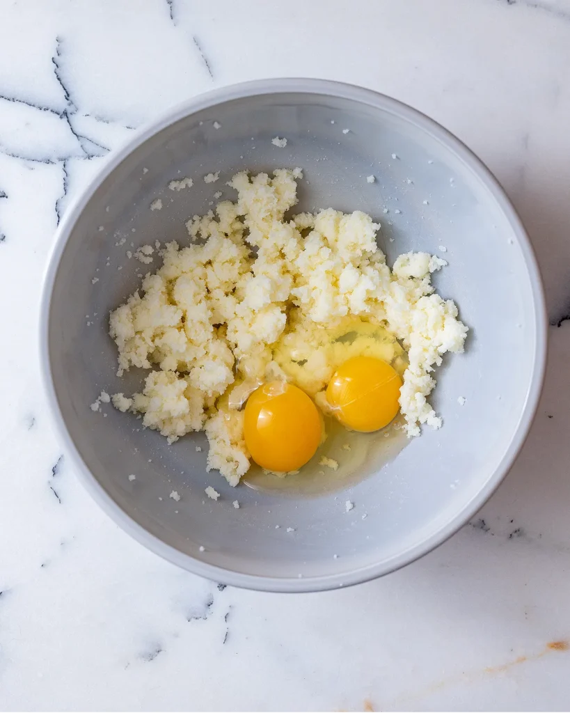 Add eggs to butter and sugar