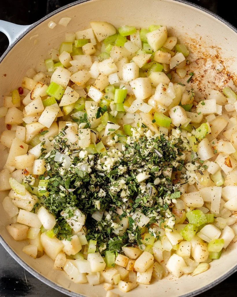 Add garlic rosemary and sage