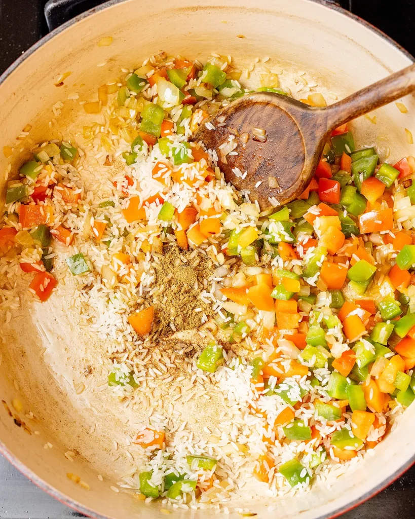 Add rice and cumin