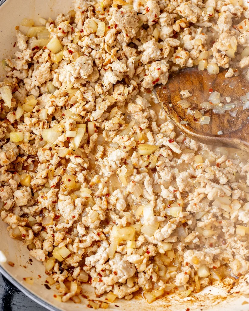 Add vermouth to ground chicken