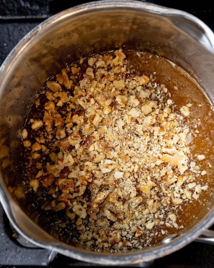 Add walnuts to caramel