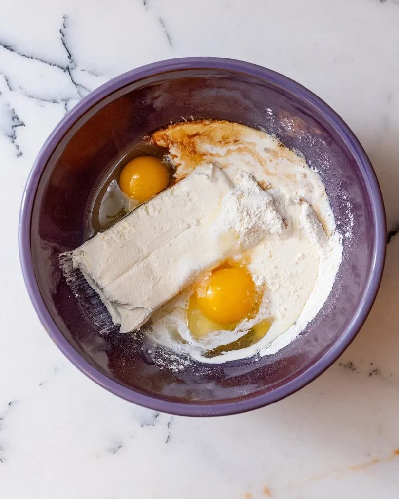 Cream cheese, eggs, flour, sugar, and vanilla
