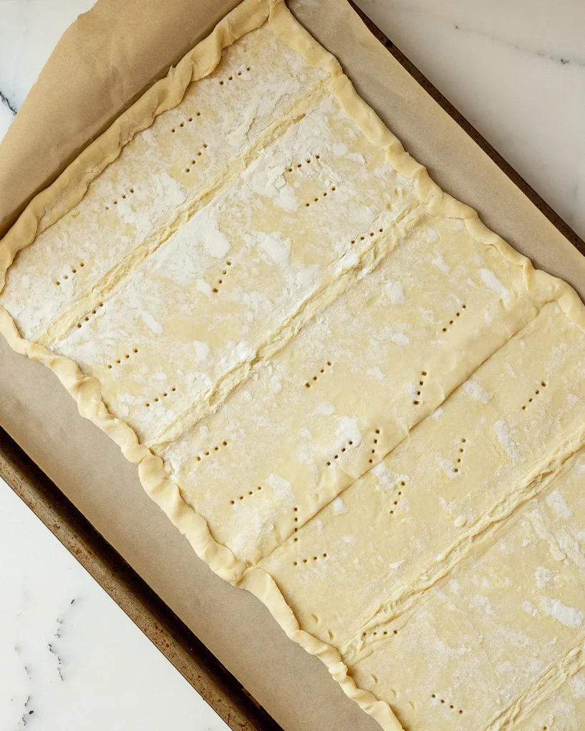 Prick holes in puff pastry