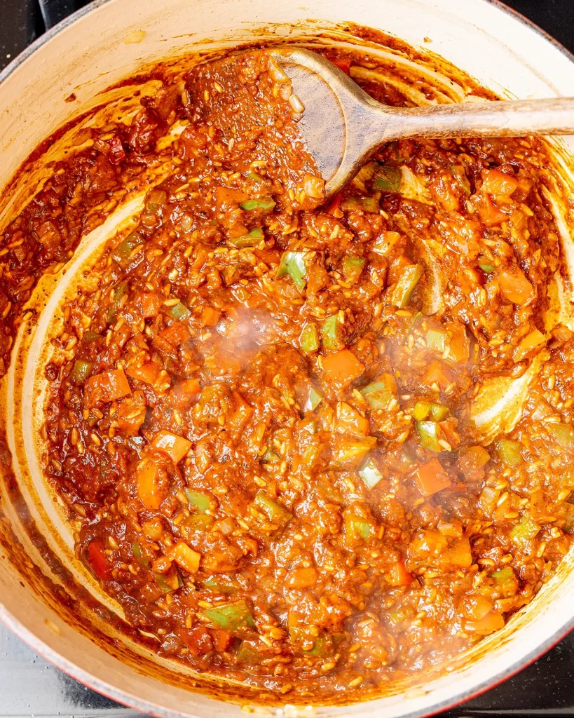 Saute aromatics in homemade chipotle sauce