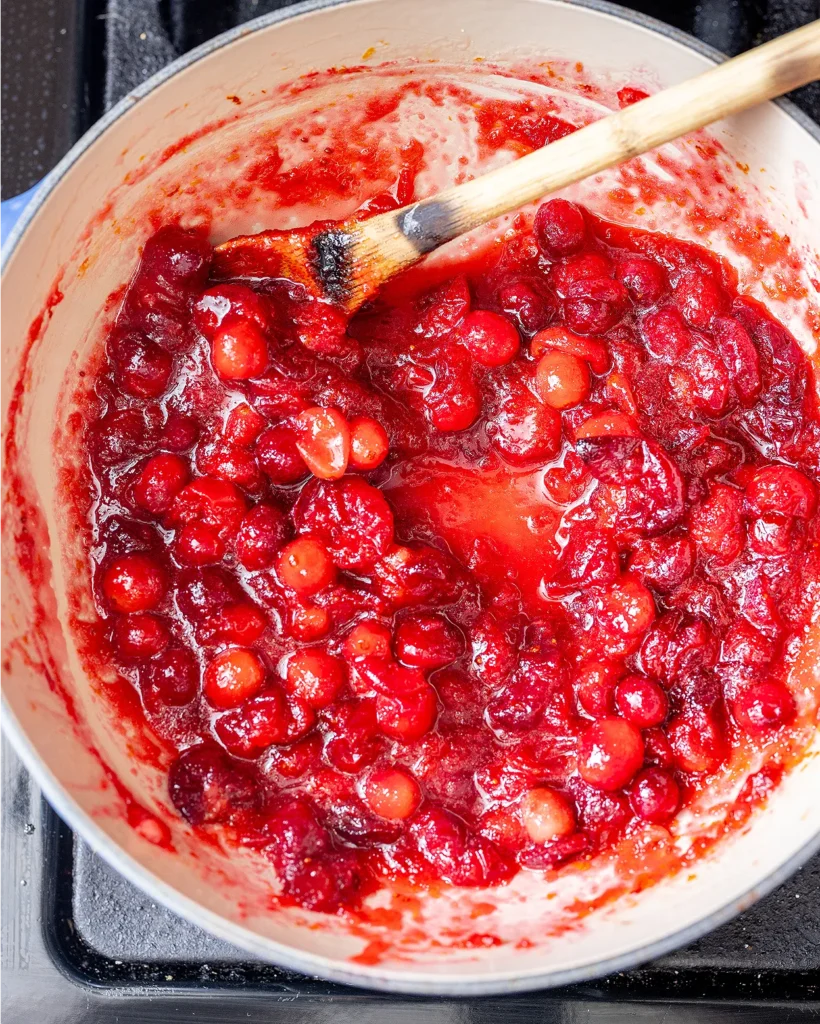Simmer cranberries until soft