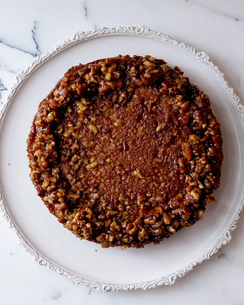 Upside down cake with pumpkin and walnuts