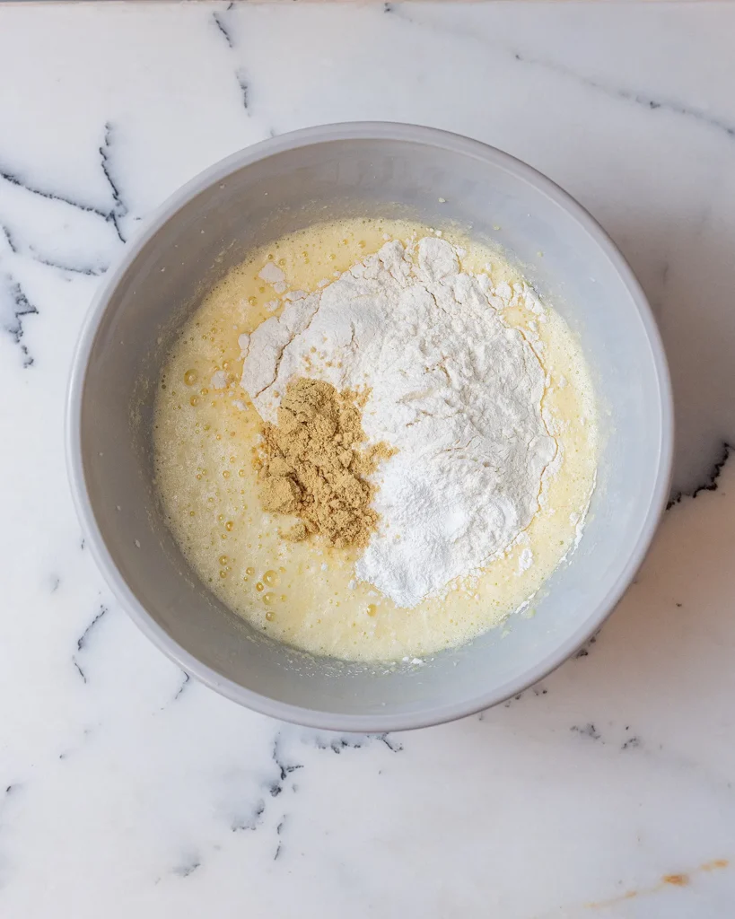 Add dry ingredients to cake batter