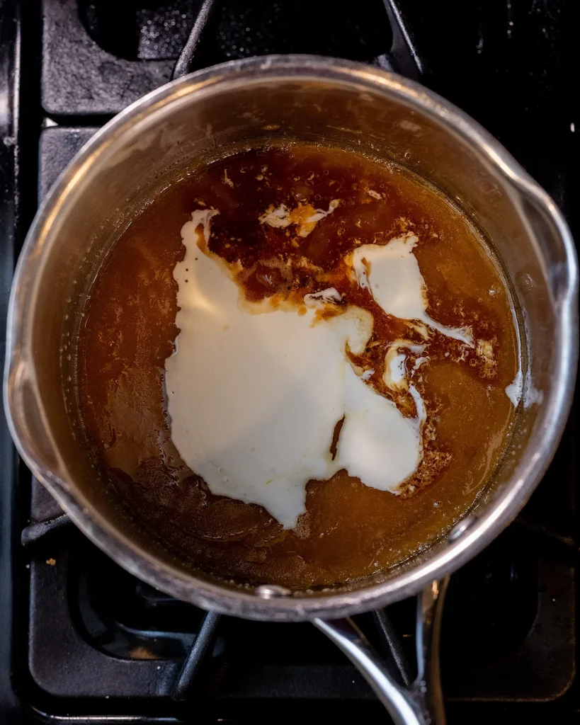 Add heavy cream and vanilla to pot