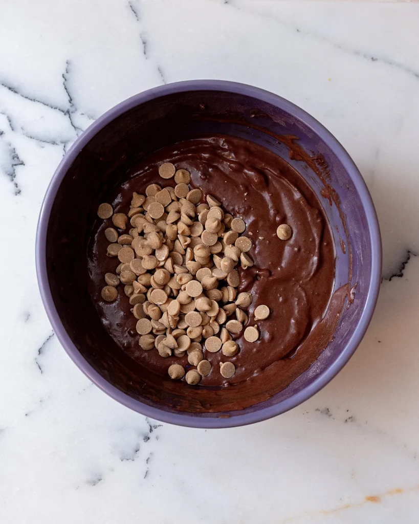 Add peanut butter chips to chocolate cake