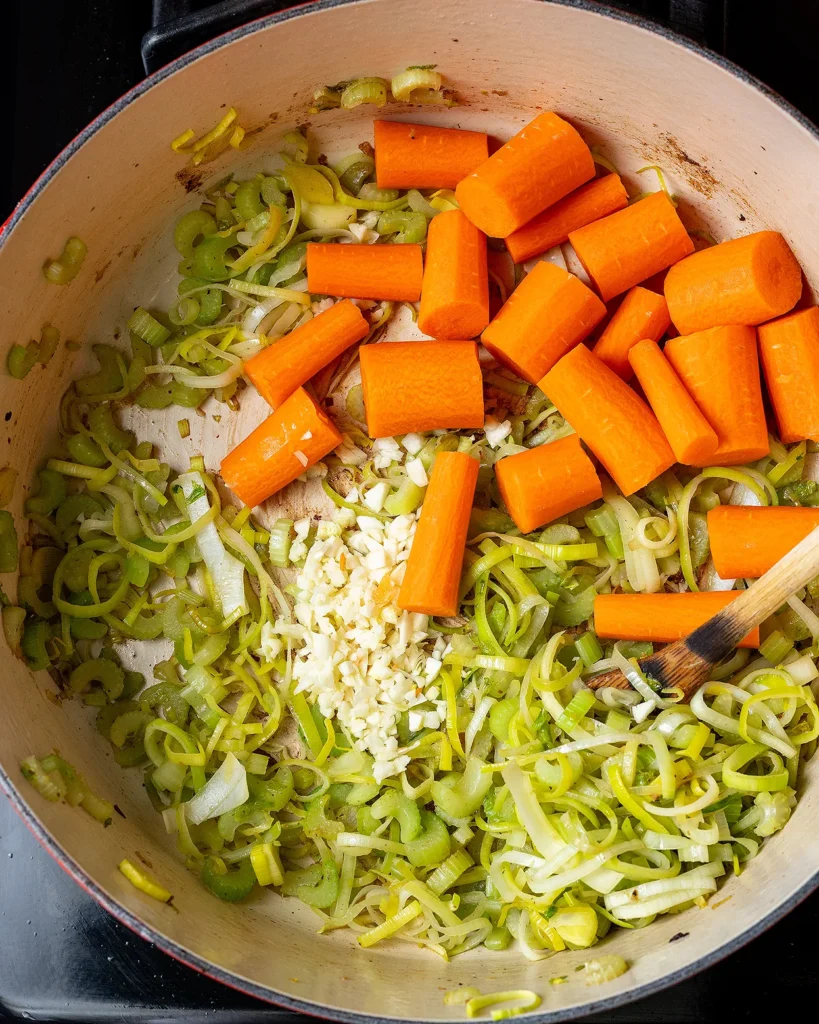 Add carrots and garlic