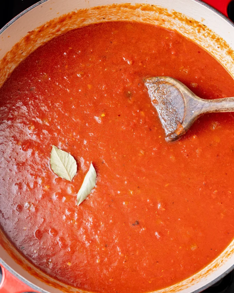 Add crushed tomatoes