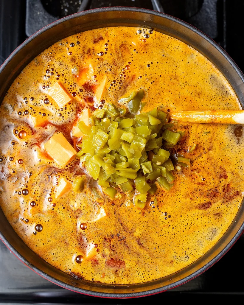 Add diced green chile peppers