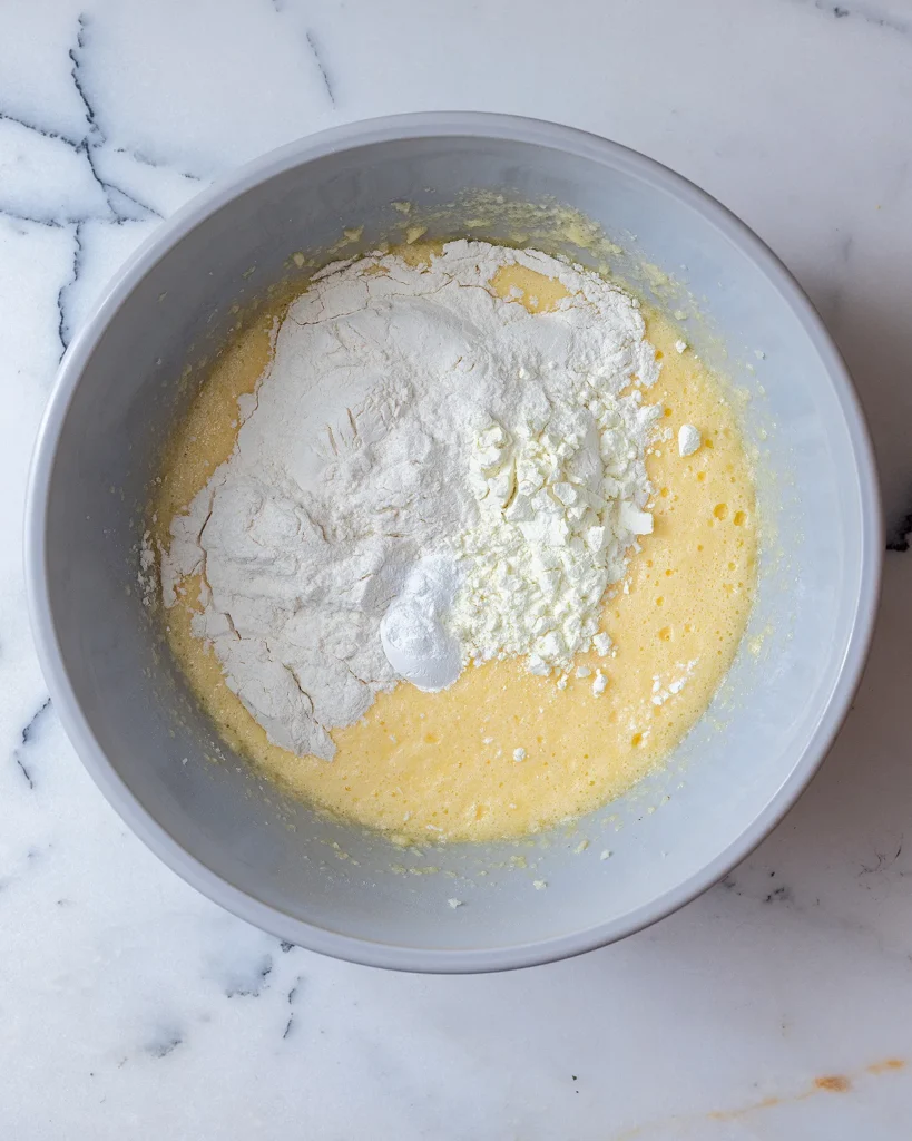 Add dry ingredients to cake