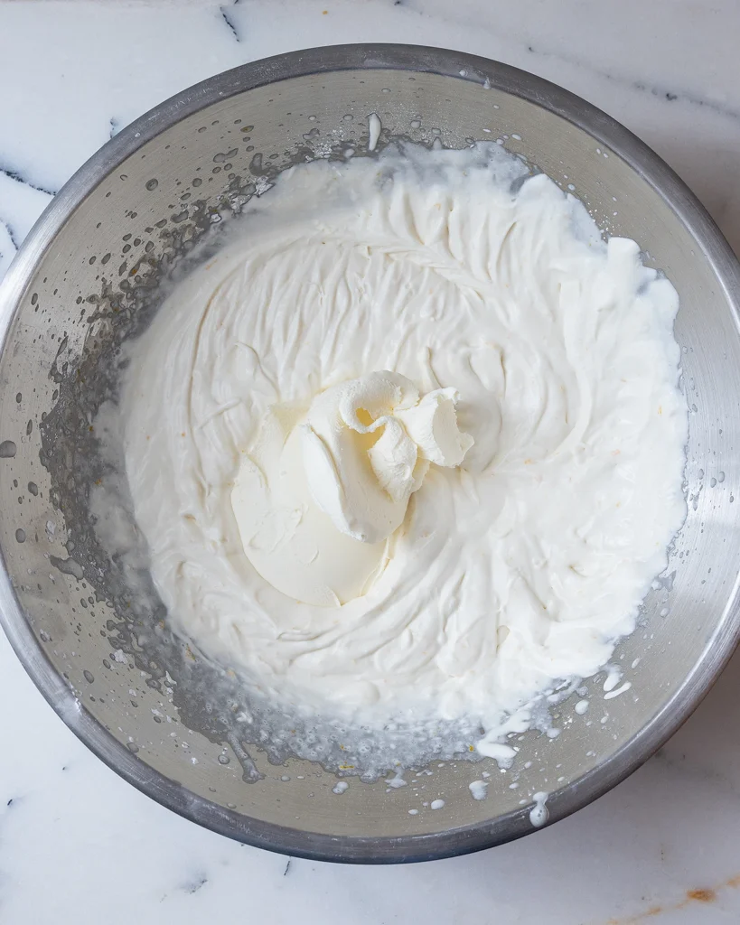 Add mascarpone cheese to frosting