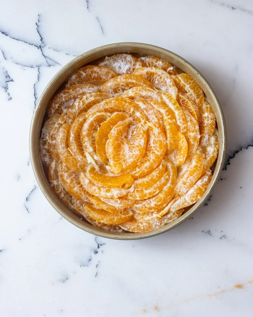 Arrange orange slices