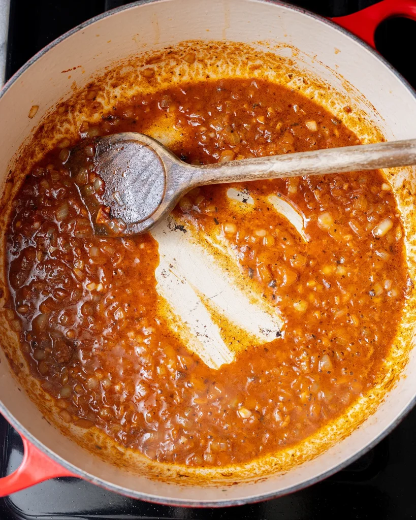 Cook vermouth until thickened