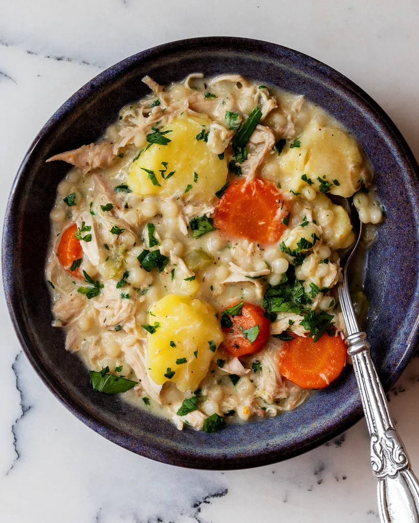 Creamy chicken with pearl couscous stew