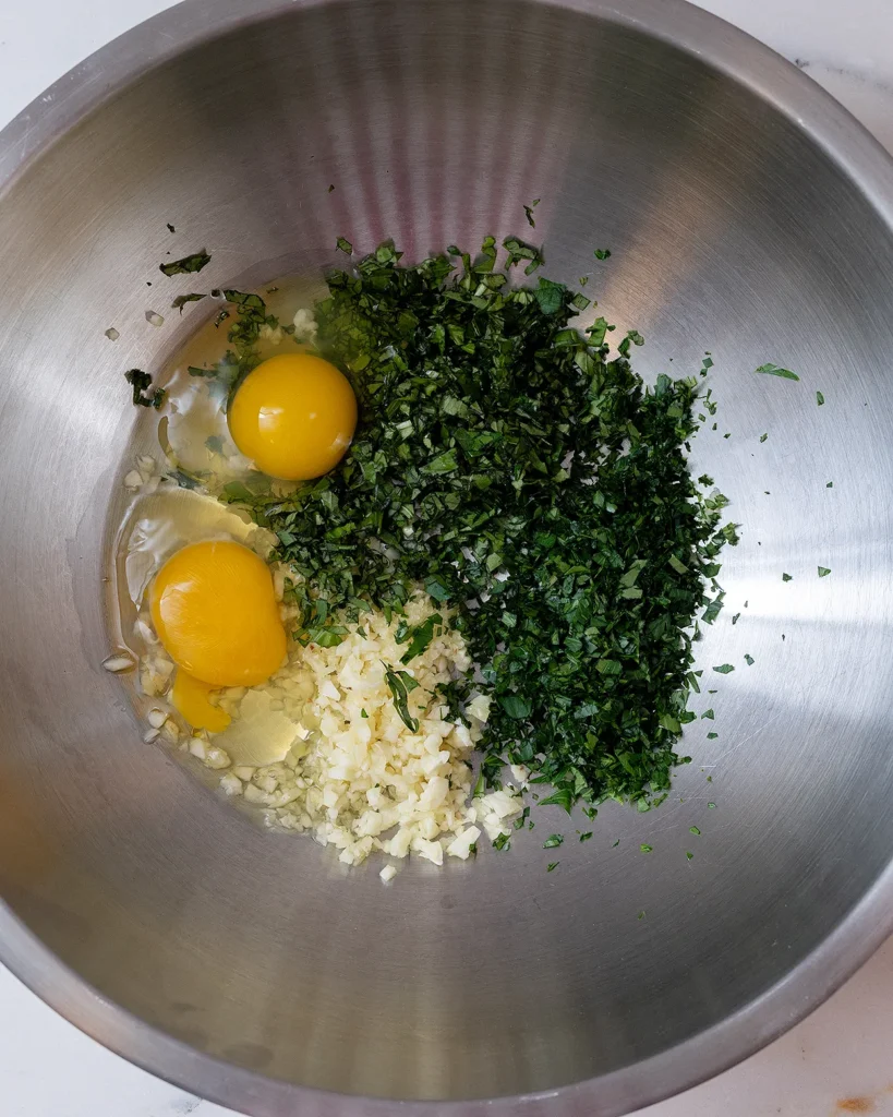 Herbs and eggs for beef meatballs