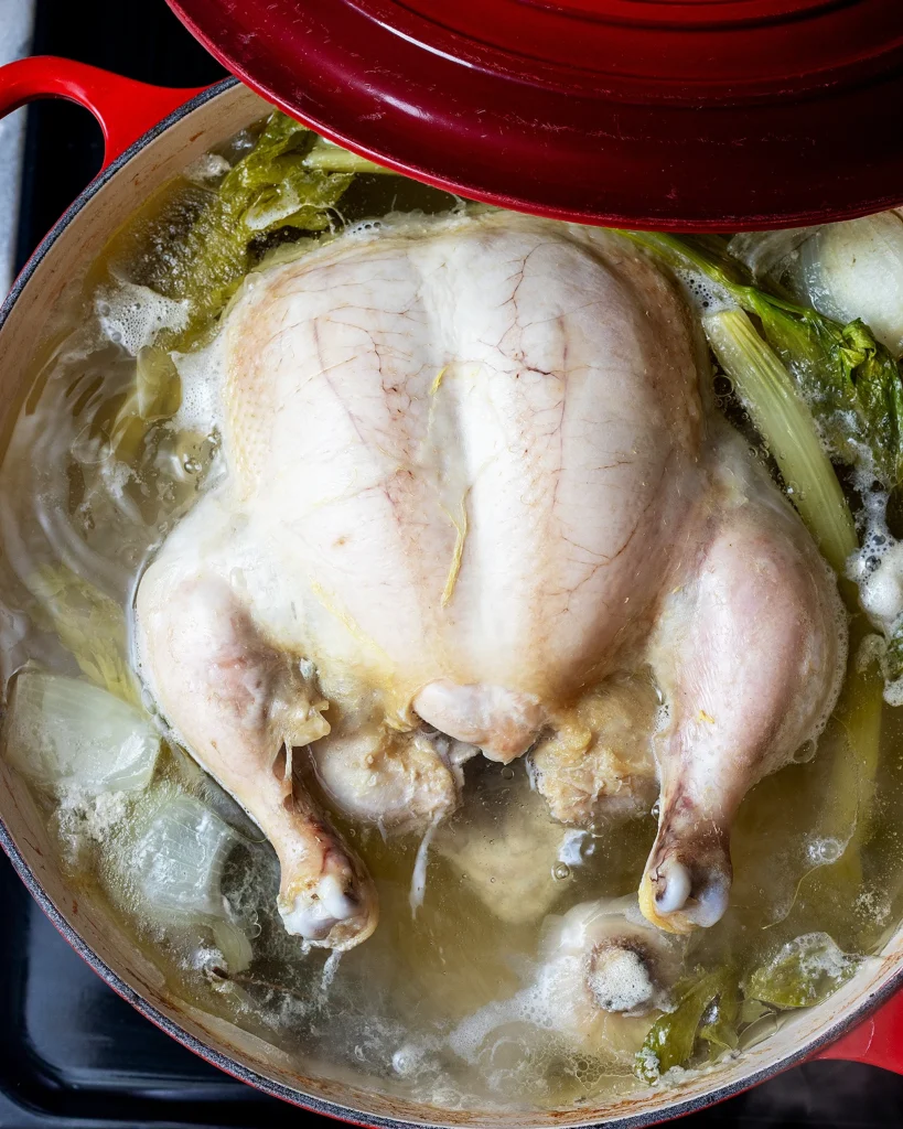 How long to simmer whole chicken