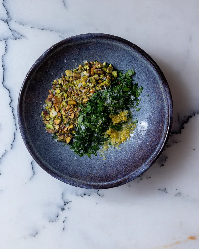 Pistachio parsley and lemon garnish