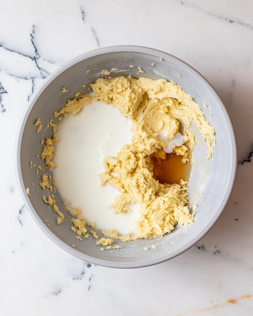 Add amaretto and milk to cake batter