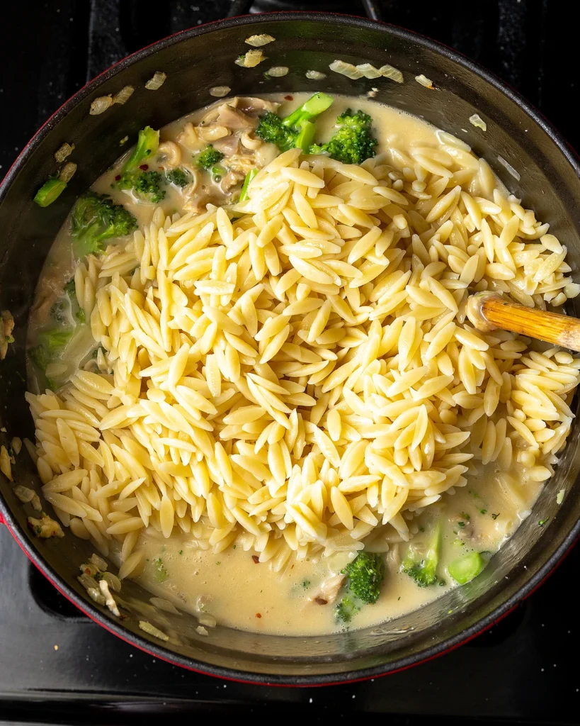 Add cooked orzo