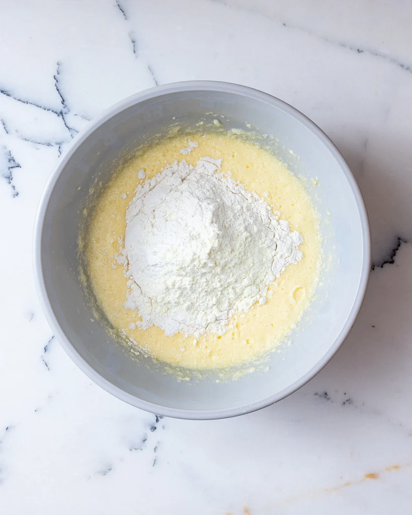 Add dry ingredients to cake batter