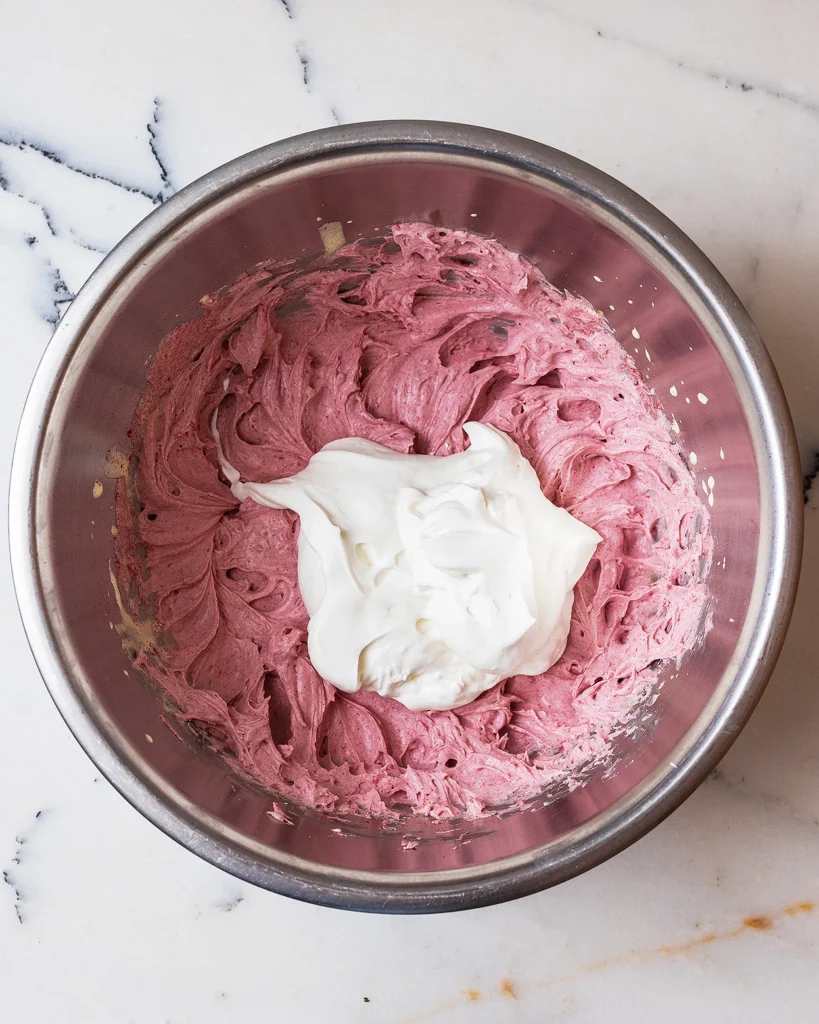 Add whipped cream to raspberry mascarpone