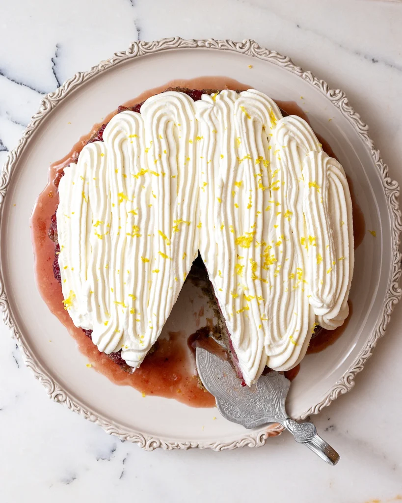 Frost the raspberry upside-down cake