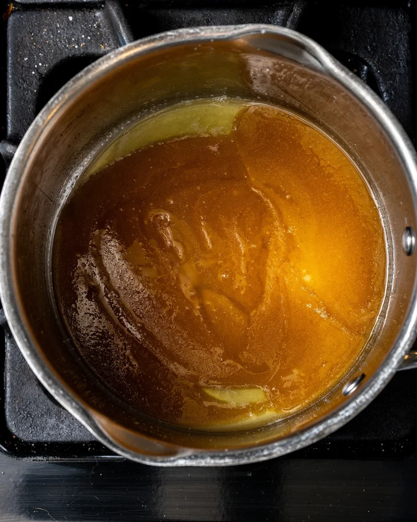 Melt sugar into butter for caramel