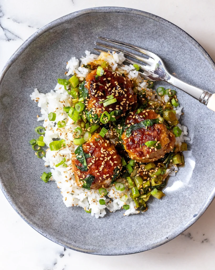 Serve orange chicken meatballs with scallions