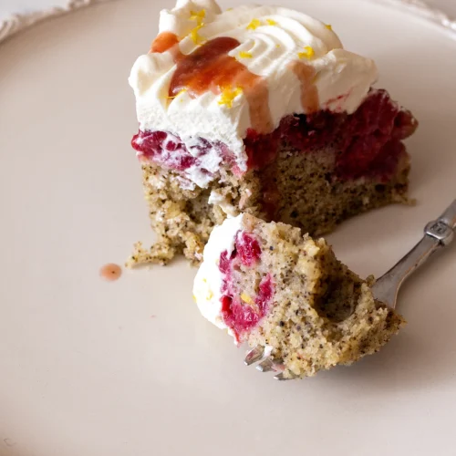 Serve raspberry London Fog upside-down cake with syrup from cake