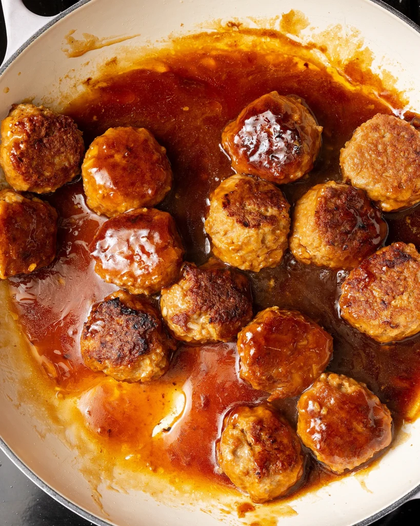 Simmer until orange sauce is thick