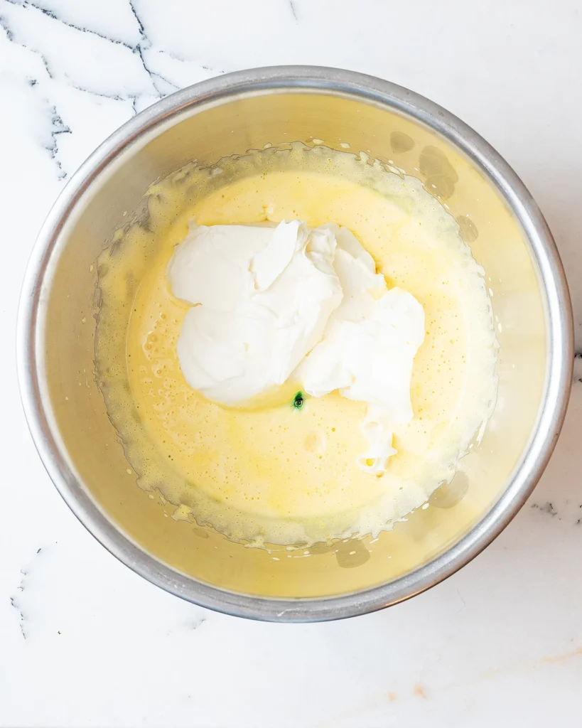 Add mascarpone to eggs