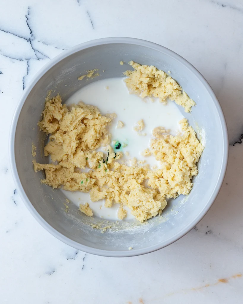 Add milk food coloring and vanilla and mint extract