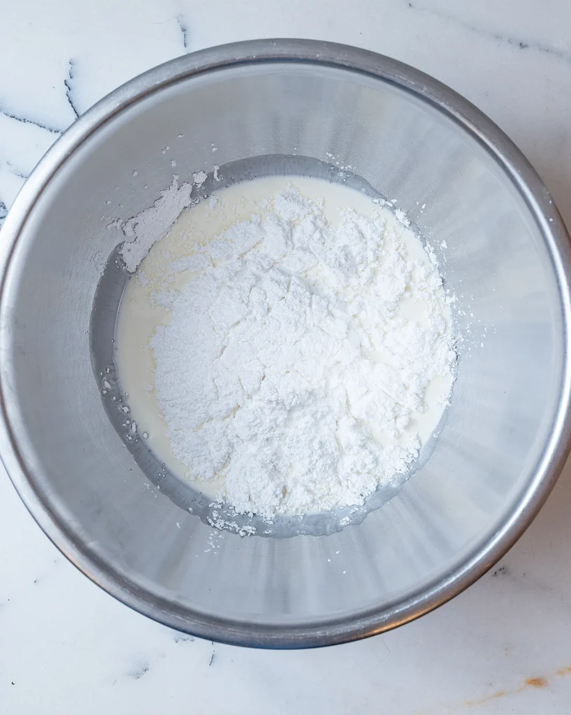 Powdered sugar with heavy cream