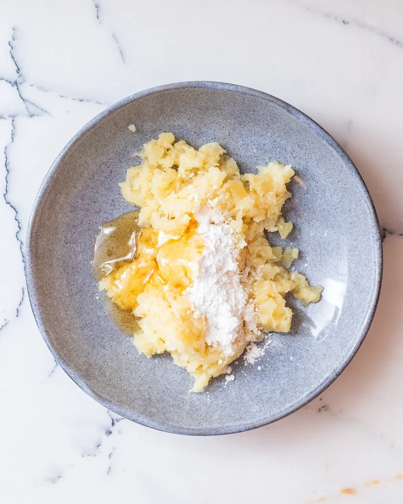 Add cornstarch and honey to pineapples