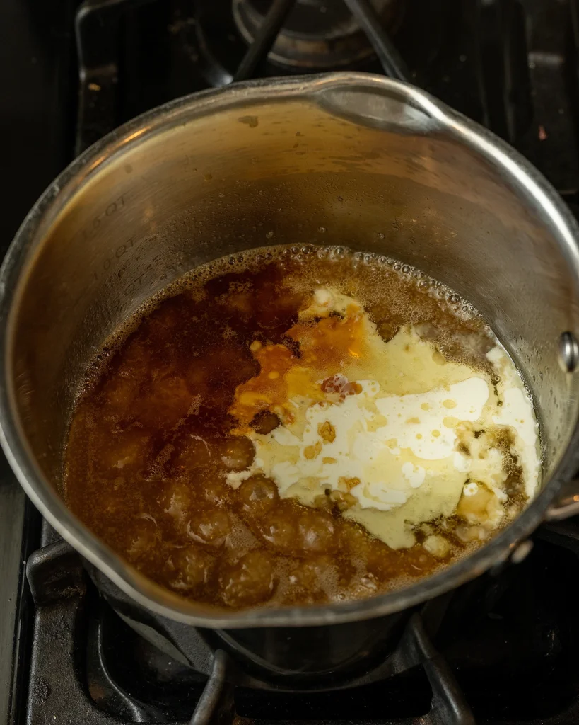 Add cream and vanilla to caramel