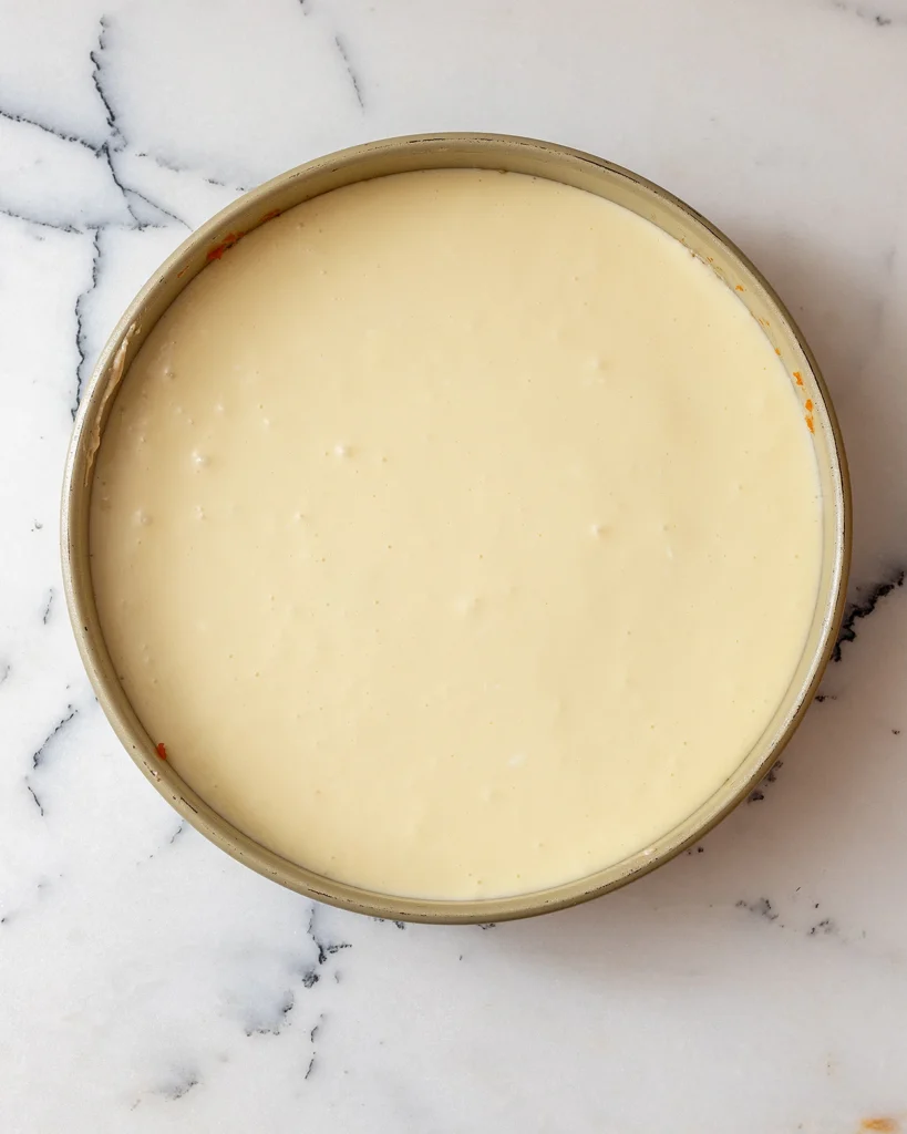Add cream cheese to cake pan