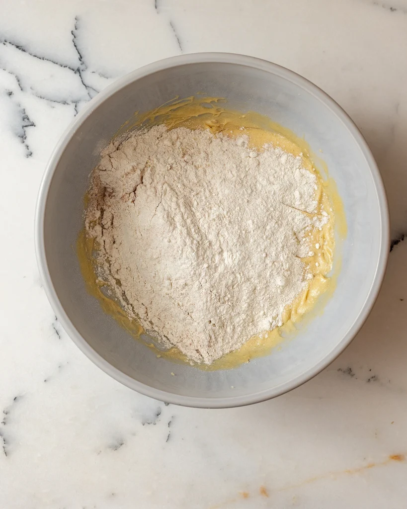 Add dry ingredients to batter