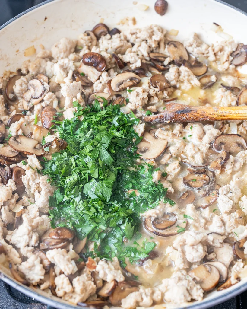 Add parsley to chicken