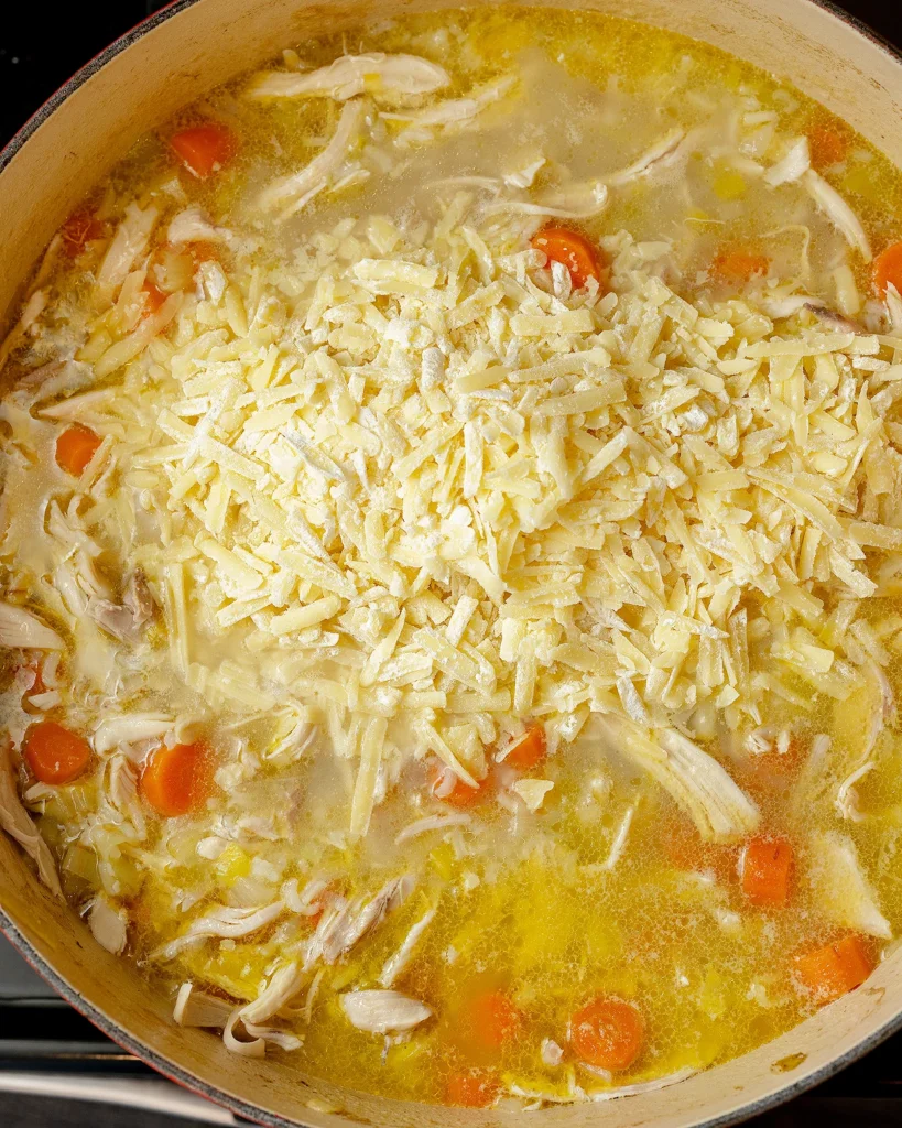 Add shredded cheddar