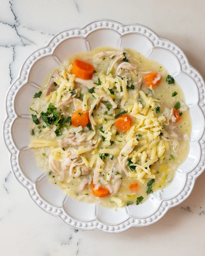 Chicken soup with cheddar and rice