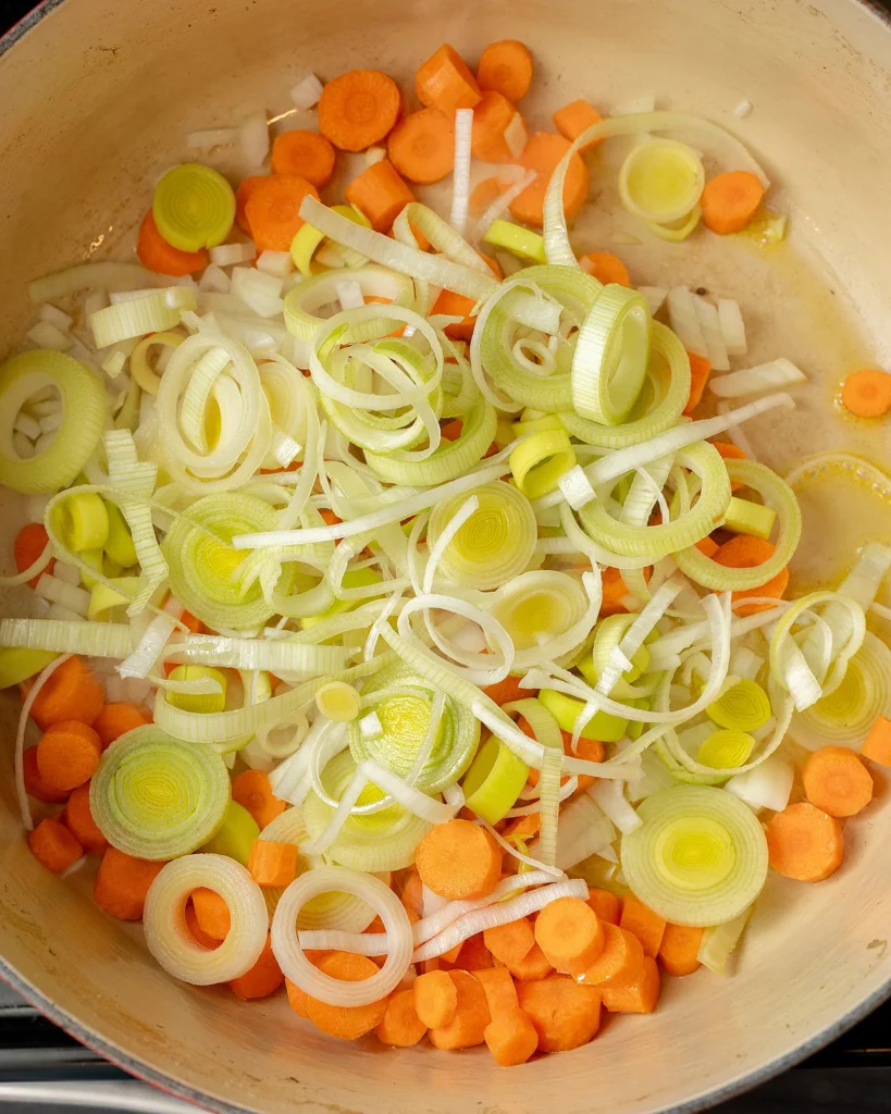 Saute leeks carrot and onion