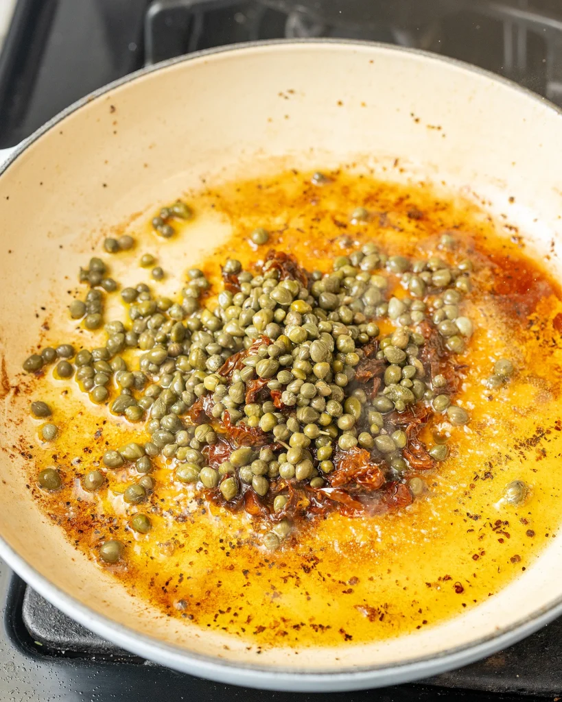 Add capers and lemon juice