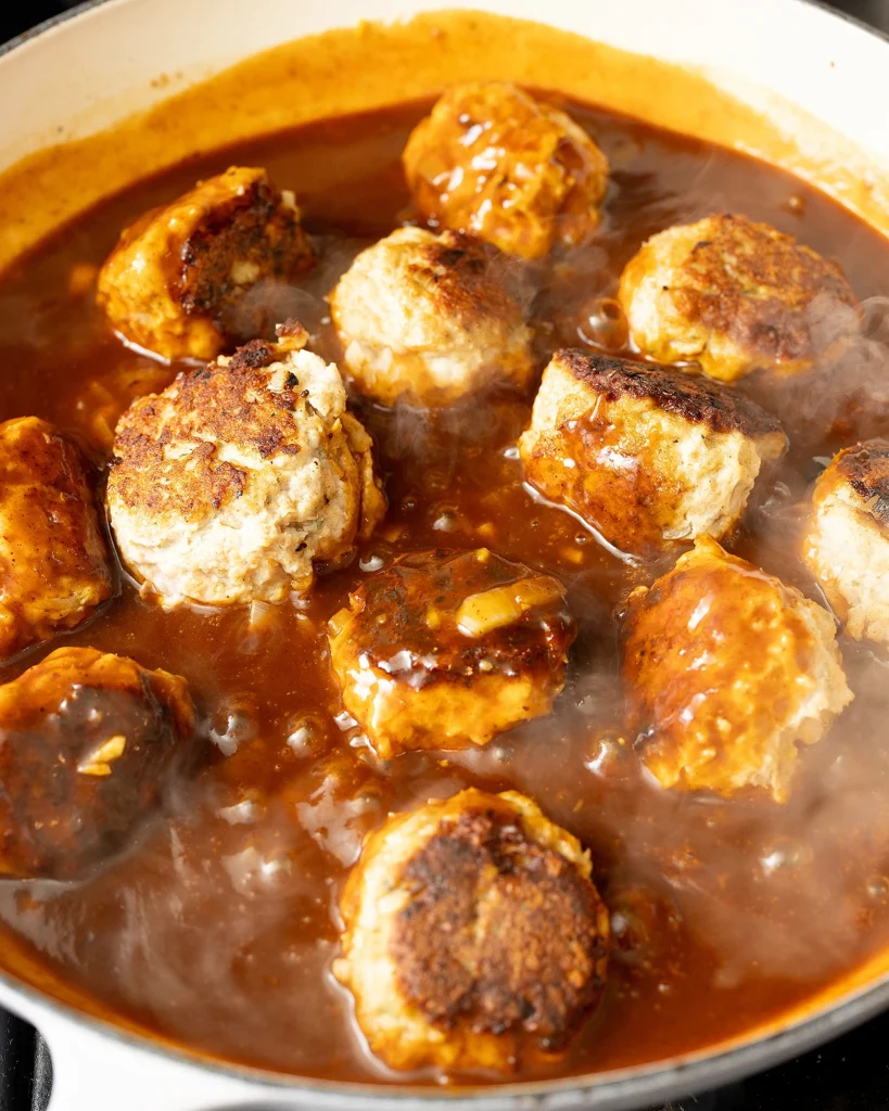 Simmer meatballs in bbq sauce
