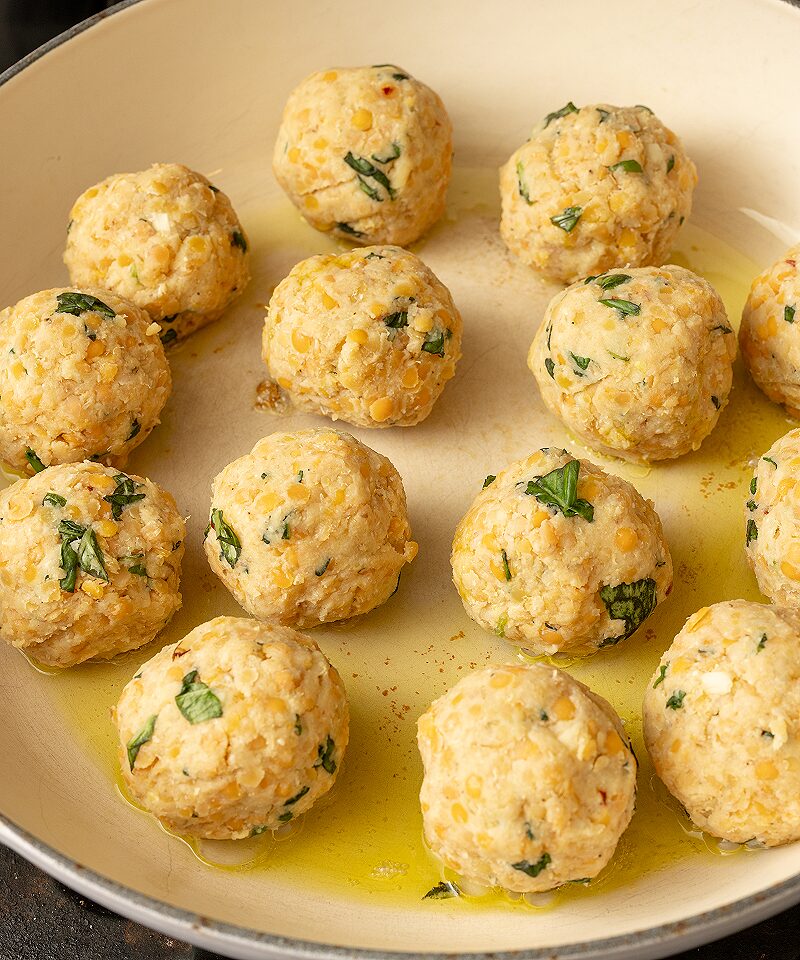 Add red lentil balls to skillet
