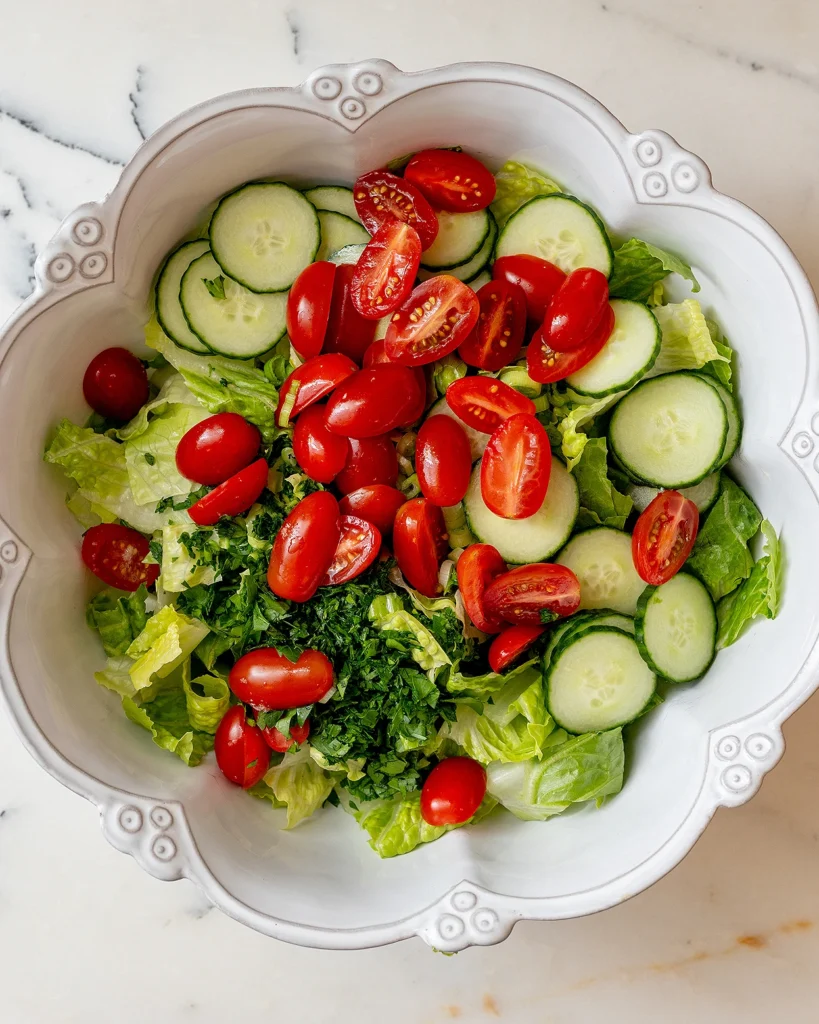 Add tomatoes to salad