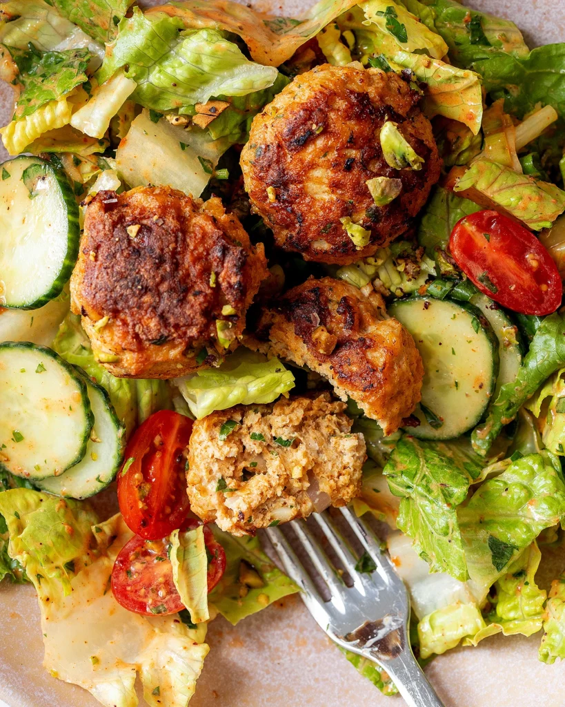 Chicken meatballs on salad